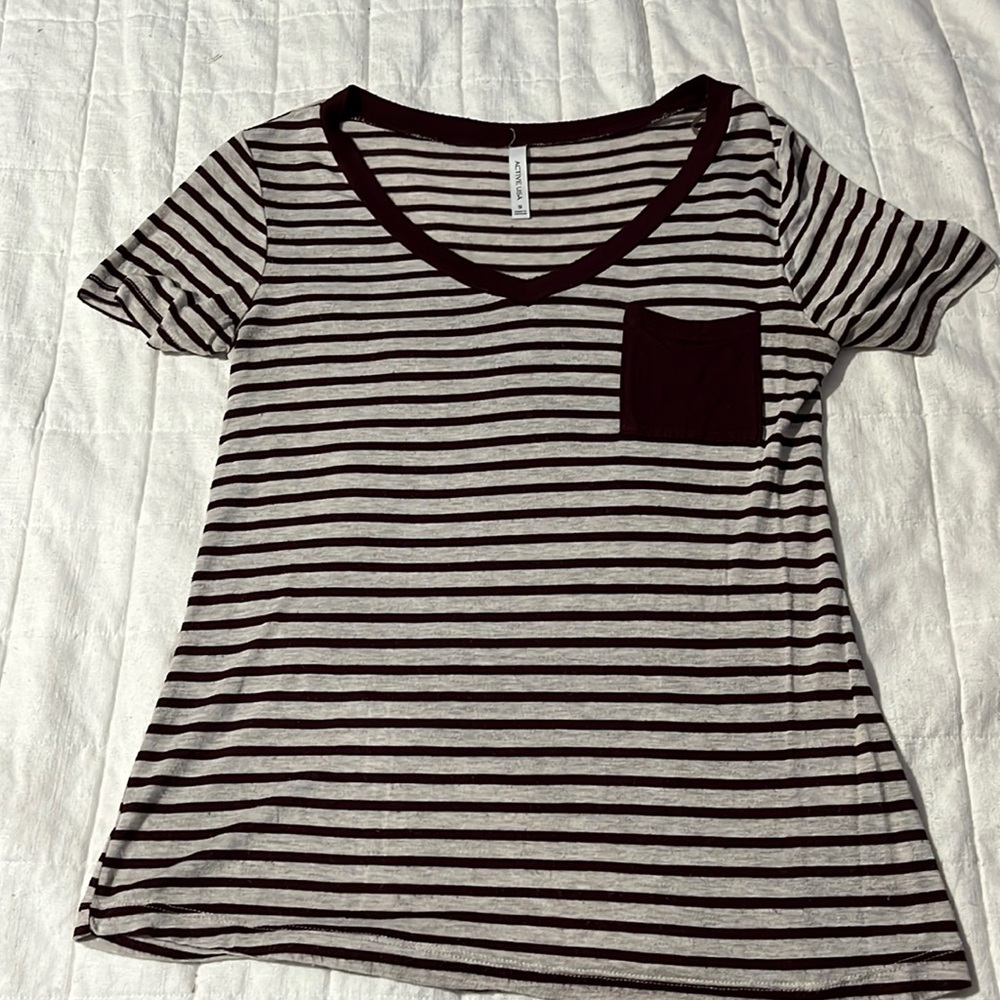Red and grey v-neck shirt